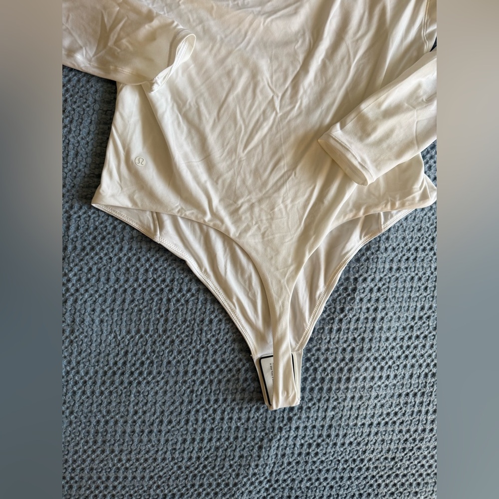 Lululemon white wundermost Long Sleeve Bodysuit,  L